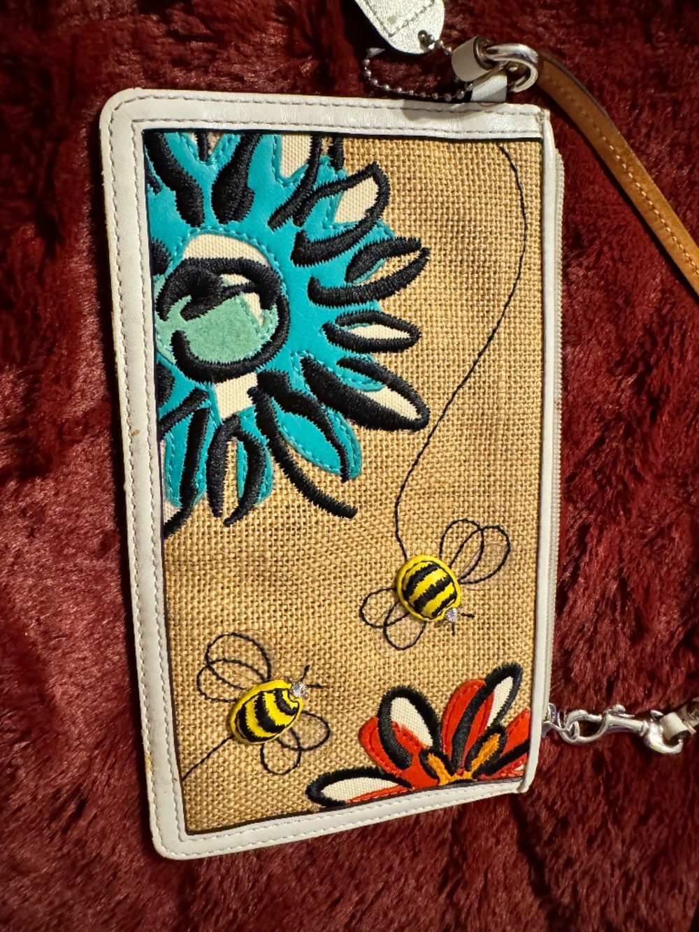 Coach Wristlet With Embroidered Bumblebee And flowers.  Burlap With leather trim